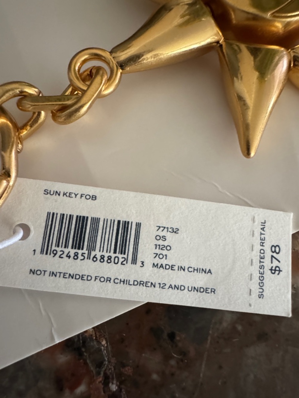 New w/tag Tory Burch Gold-tone Starburst Key Charm - Picture 2 of 3